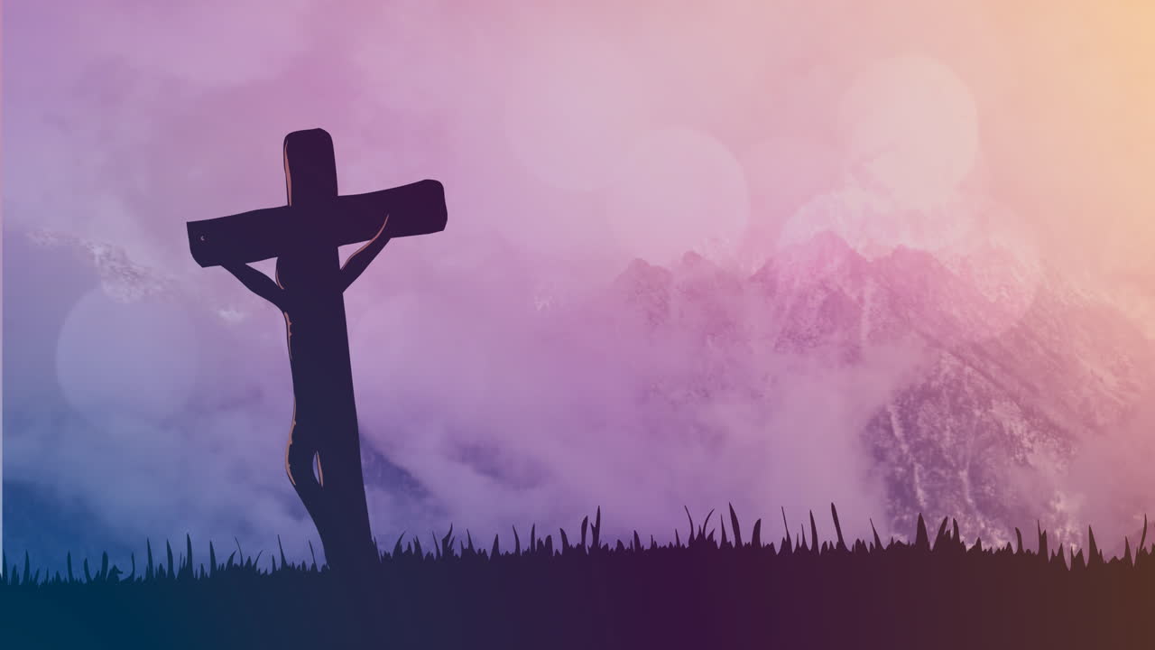 산 위에 검은 십자가 모양의 불빛의 비디오