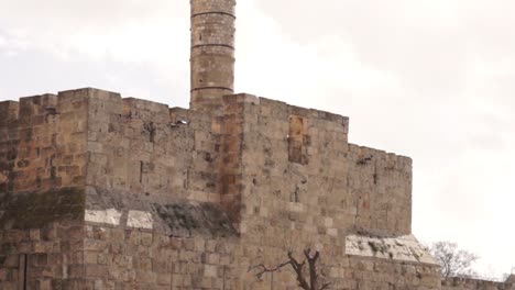 ancient city walls and tower in jerusalem