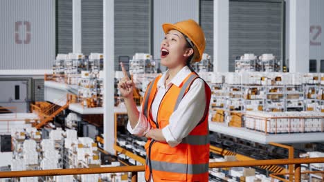 woman industrial worker in a warehouse