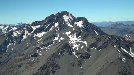 Aoraki-Mount-Cook-National-Park,-New-Zealand---view-of-Southern-Alps-rocky-mountains-with-snow-capped-peaks-from-the-scenic-flight-plane