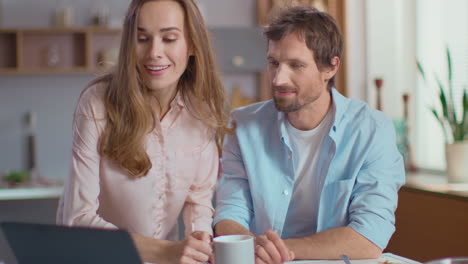 Couple-having-video-call-on-laptop