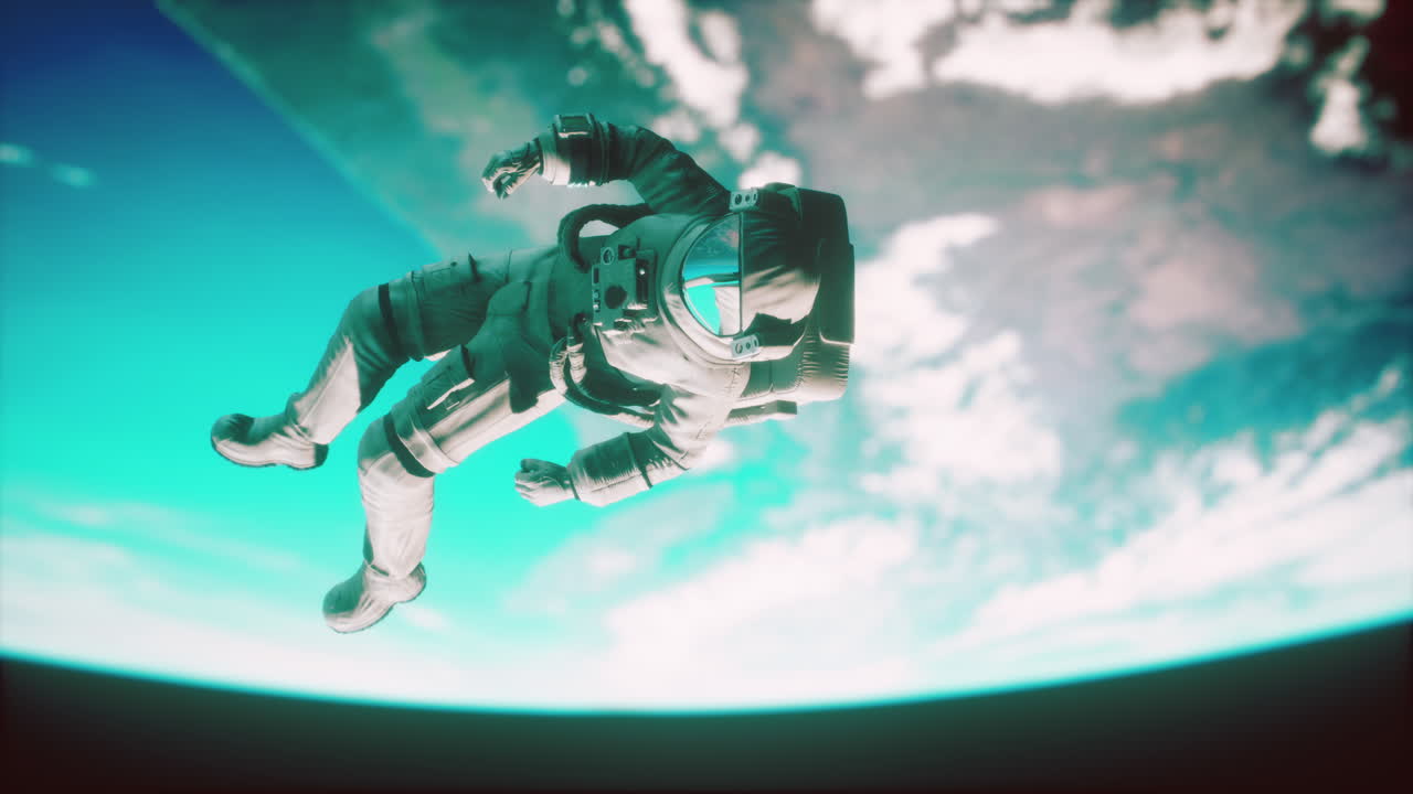 Astronaut floating above the Earth Elements of this image furnished by NASA