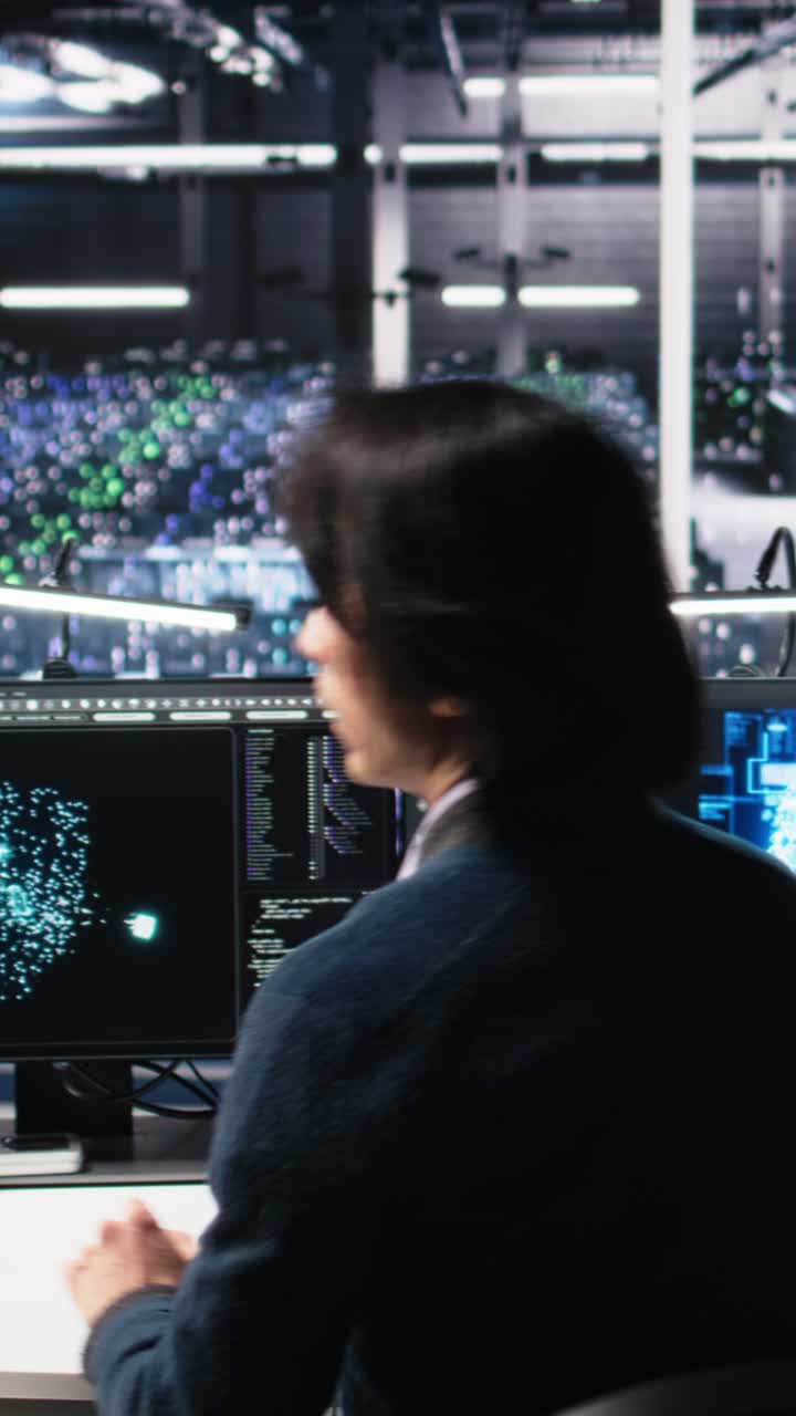 Vertical video Data center admins doing brainstorming, working on neural network software