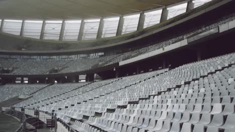 Digital-composition-of-chevron-pattern-design-over-sports-stadium-in-background