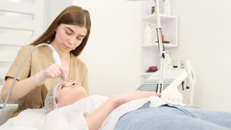 Facial treatment being done on a woman