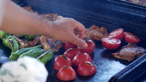 grilled chicken and vegetables on a grill