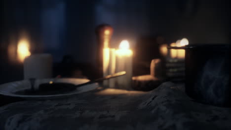 table setting in candlelight at night