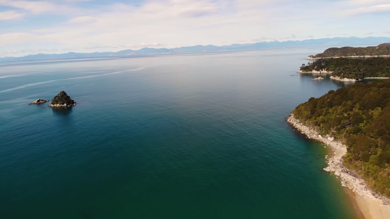 Abel Tasman aerial birds eye fly to horizon shot