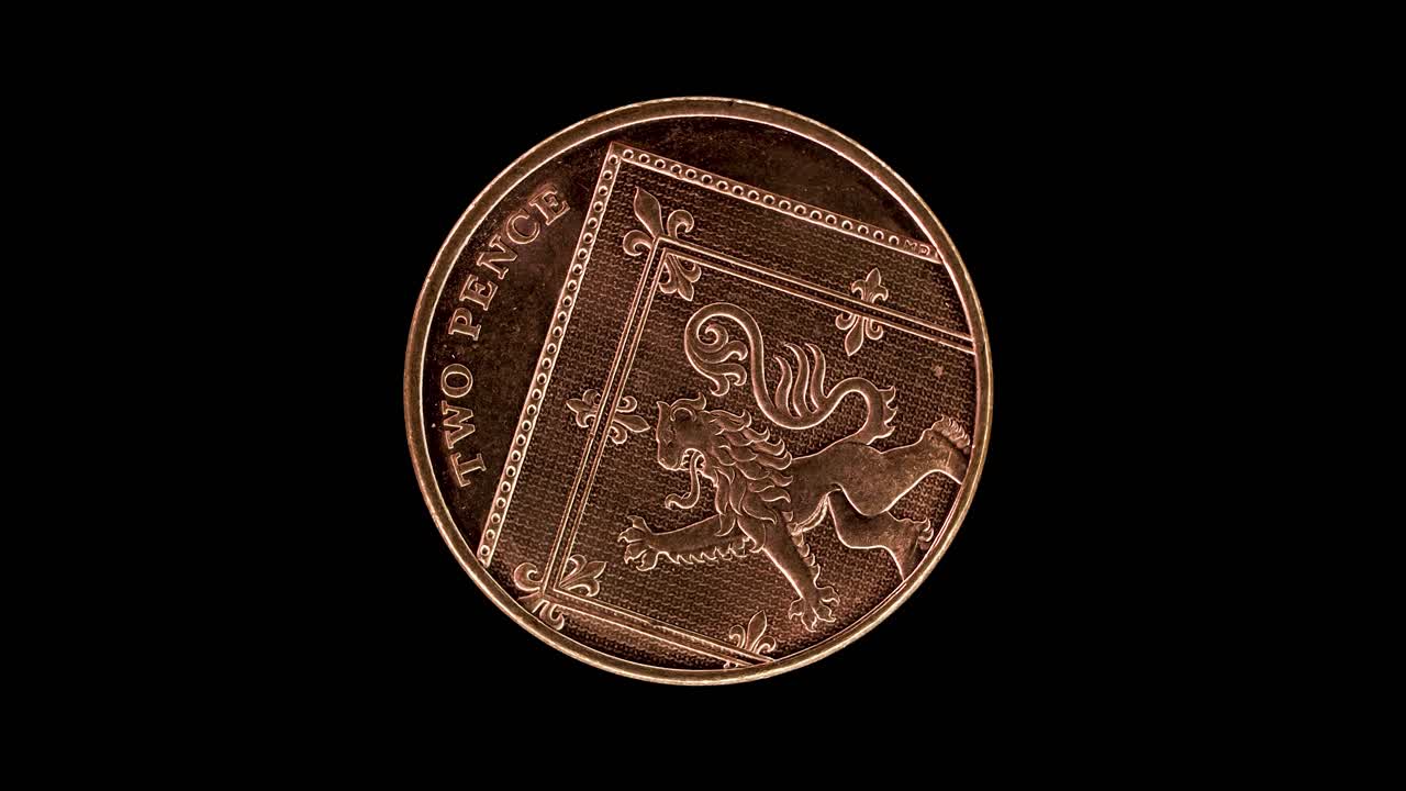 United Kingdom 2 pence 2015 reverse showing Royal Shield segment, macro loop on black background