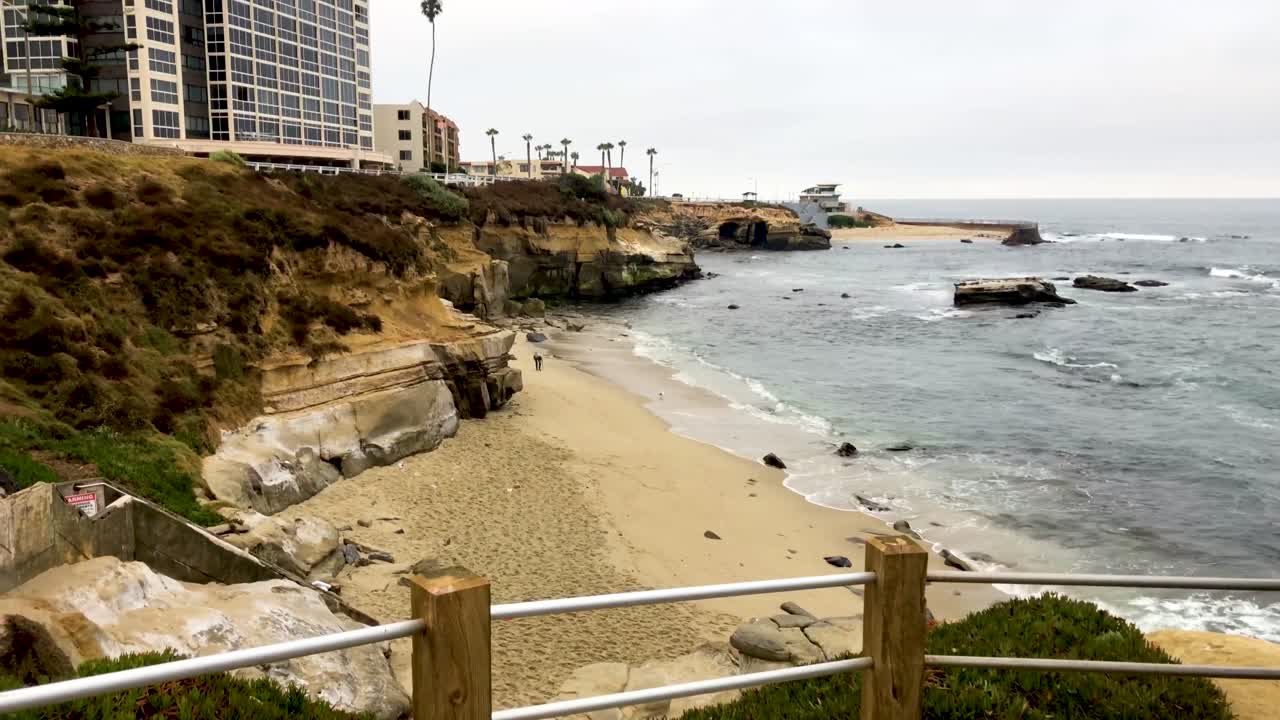 Exploring the coastline in La Jolla, California on an overcast day.