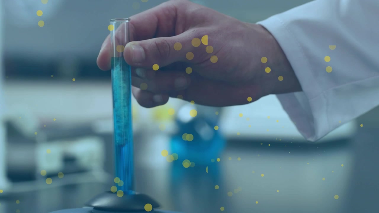 Animazione di macchie su uno scienziato maschio caucasico con una provetta.