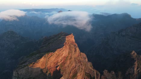 clouds moving over the mountains, showcasing a beautiful landscape