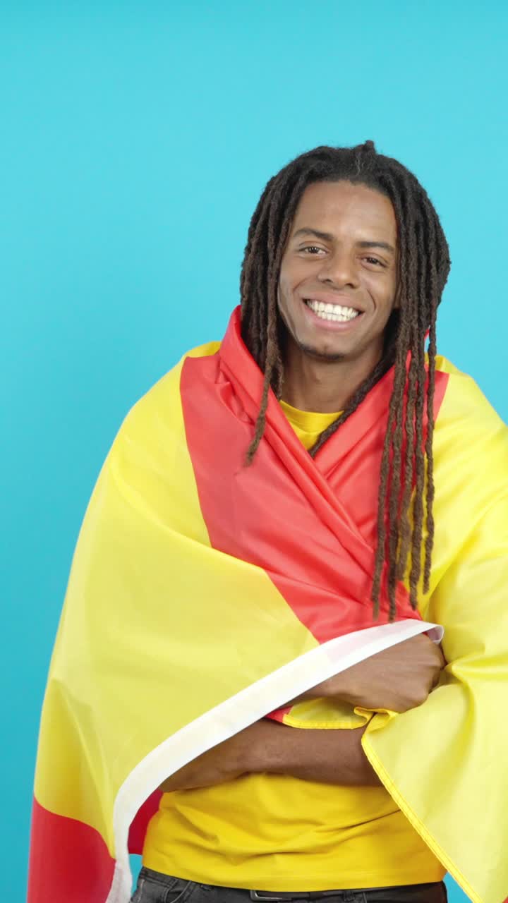 Man with dreadlocks smiling