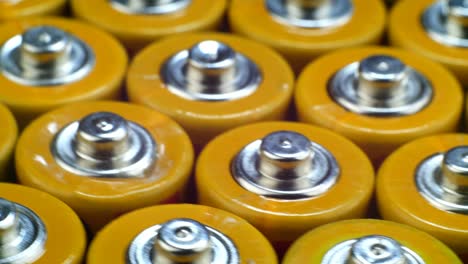 many used aa alkaline batteries, finger batteries in heap ready for recycling. harmful effects of planet earth.