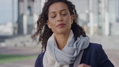 portrait-confident-mature-business-woman-looking-calm-enjoyingh-urban-commuting-travel-lifestyle-wearing-scarf-slow-motion