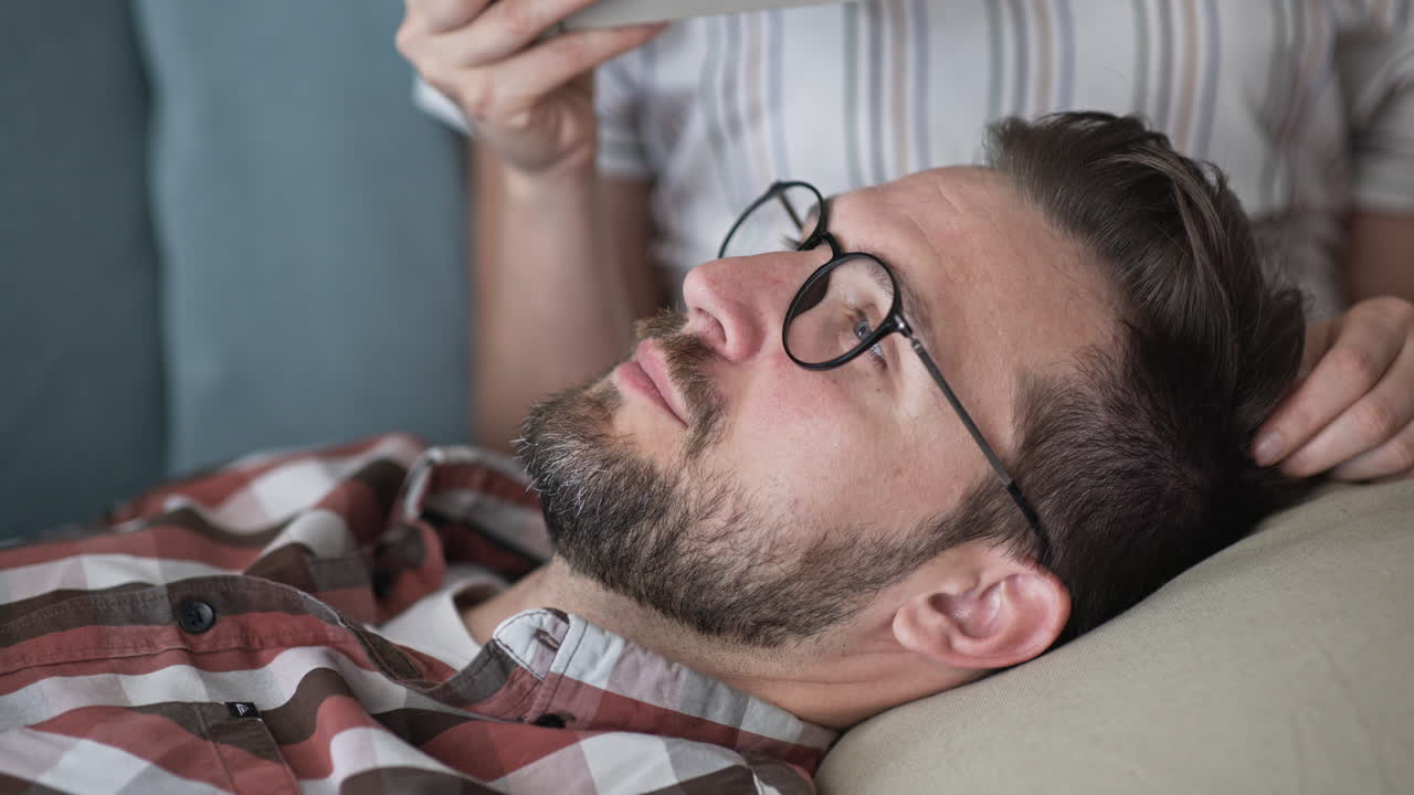 Man Relaxing on Couch