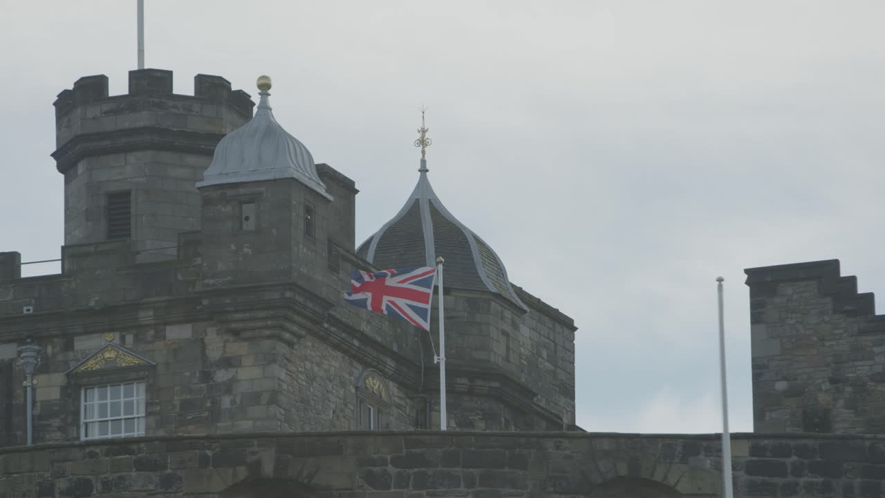 A 5K shot of the British flag flying atop Edinburgh Castle.