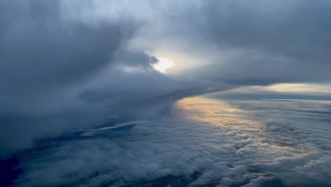 dramatic heaven view recorded from a jet cockpit while flying through a stormy sky during the deccent