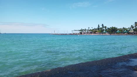 gimbal wide panning shot of kailua bay from the historic kona district on the big island of hawai'i