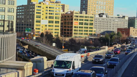 cars driving on brooklyn bridge new york city