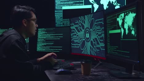 asian hacker upset with lock key on computer screen