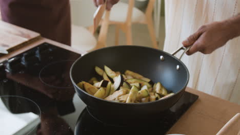 cooking eggplant in a pan