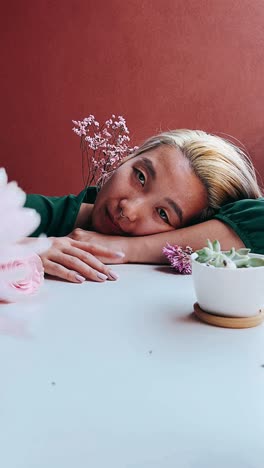 woman with flowers and plants