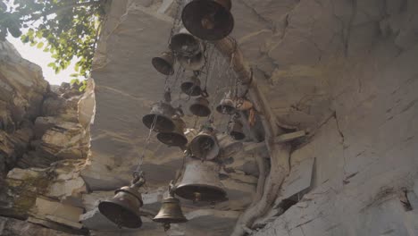 temple bells in a hindu temple in a forest of india