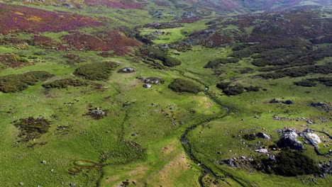 Drone-push-in-above-meander-winding-river-in-segundera-mountainous-region-of-zamora-spain,-aerial