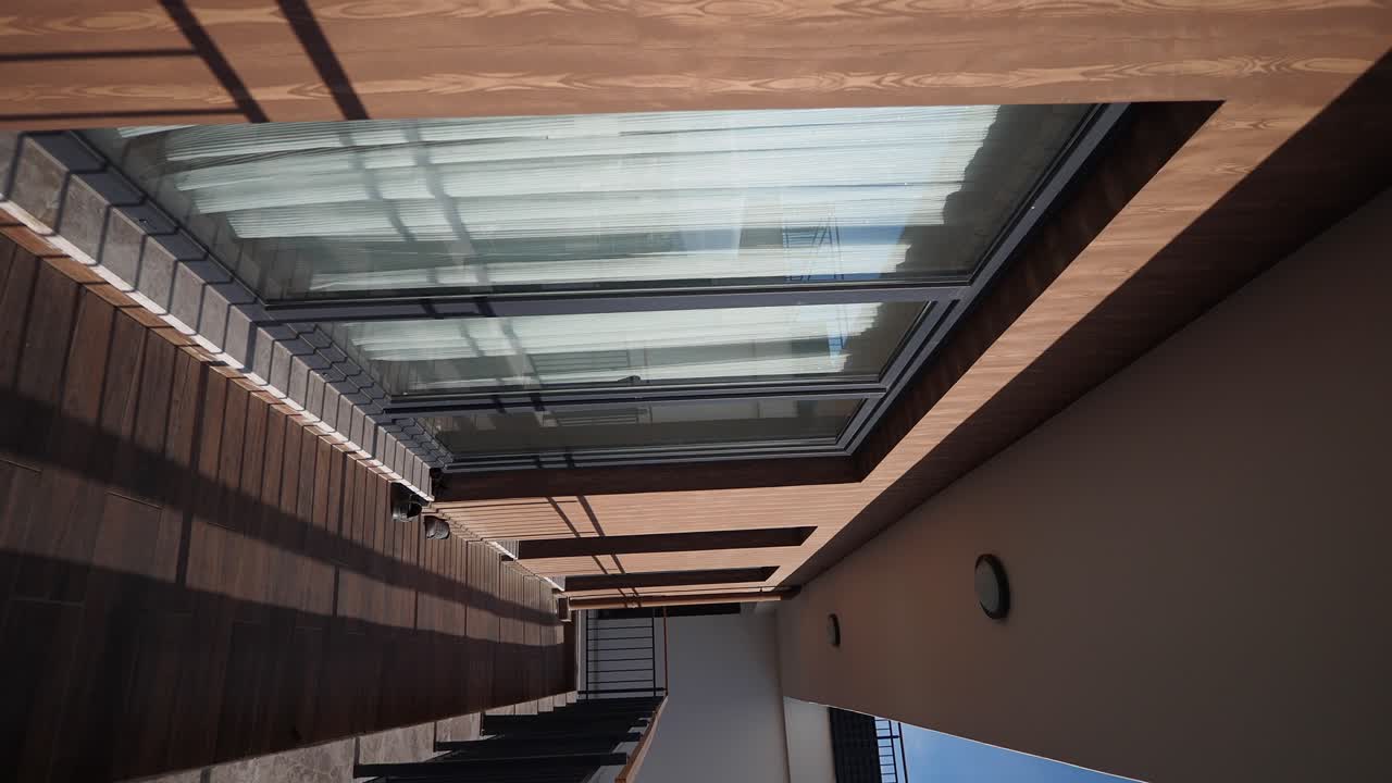 Modern Interior with Skylight and Wooden Accents