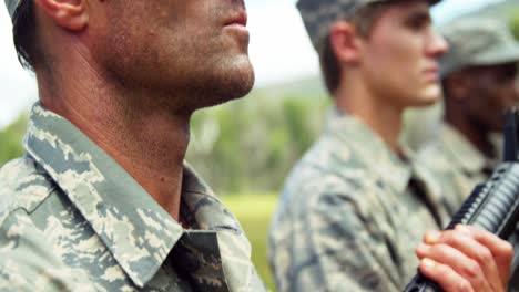 group of military soldiers standing with rifles 4k