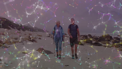 una pareja de ancianos caucásicos haciendo senderismo en el campo, a través de una colorida red de conexiones móviles.