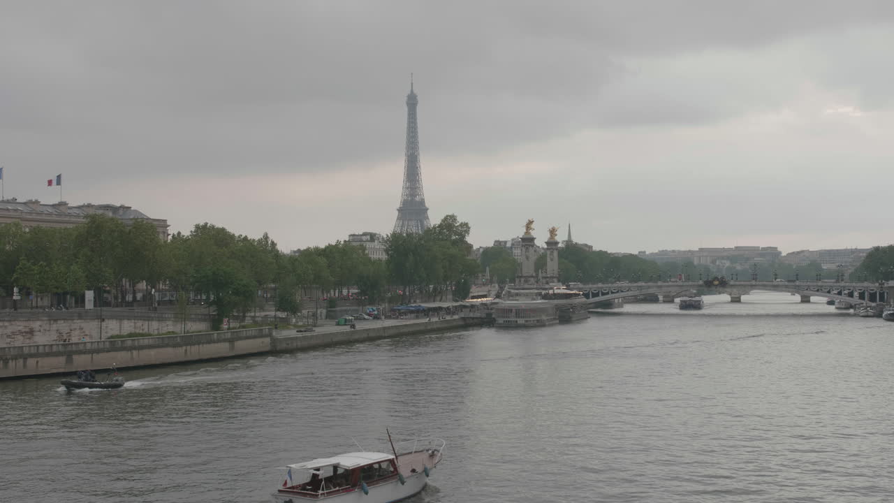 Paris Cityscape on Cloudy Day, Boats Floating in Seine River With Eiffel Tower in Background