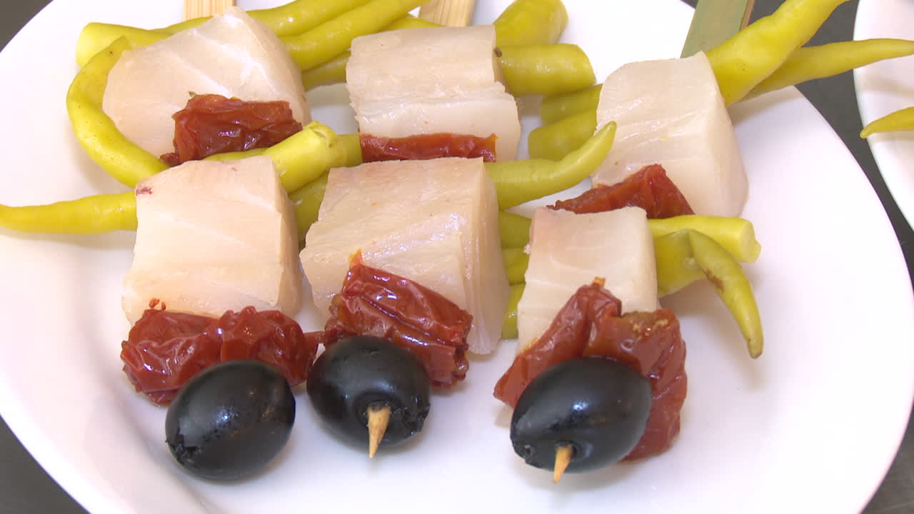 Appetizer Skewers with White Fish, Sun-dried Tomatoes, and Olives