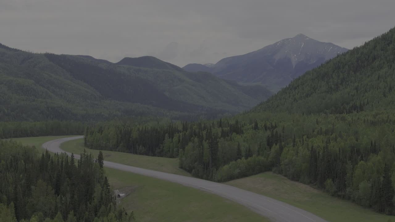A scenic stretch of the Alaska Highway near Muncho Lake