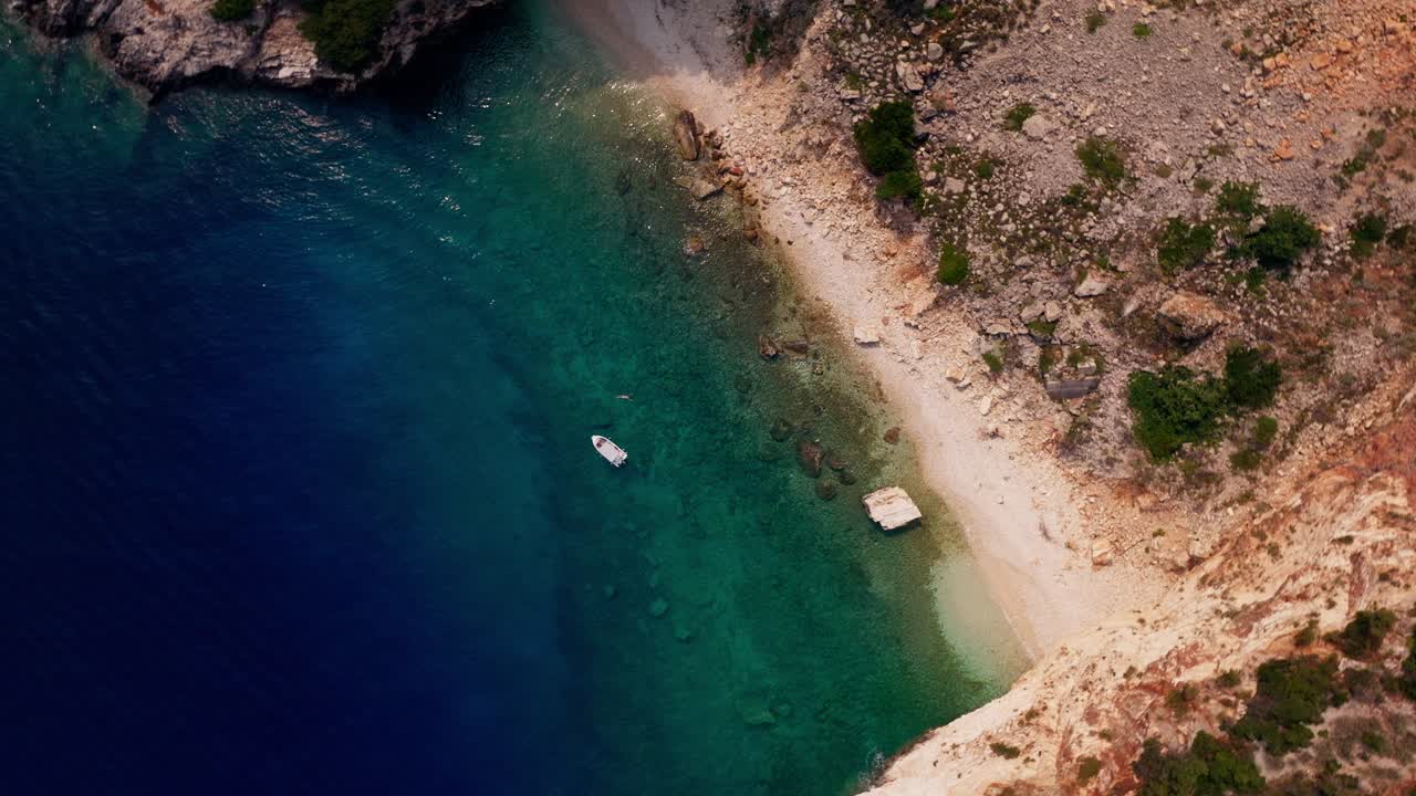 A cinematic aerial shot of the island Ithaca in Greece