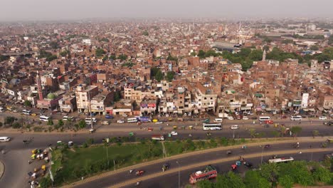 aerial view of lahore, pakistan cityscape, showcasing dense, crowded streets and urban life in punjab's bustling capital city.