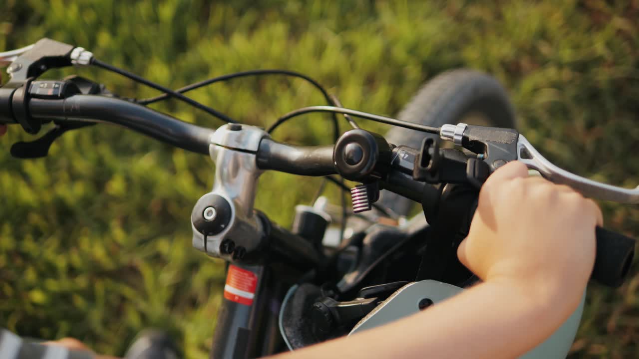 Man ride bicycle near beach in Barcelona, city morning, carbon neutral transportation. Travel, sustainability and cycling with male speed and transit,