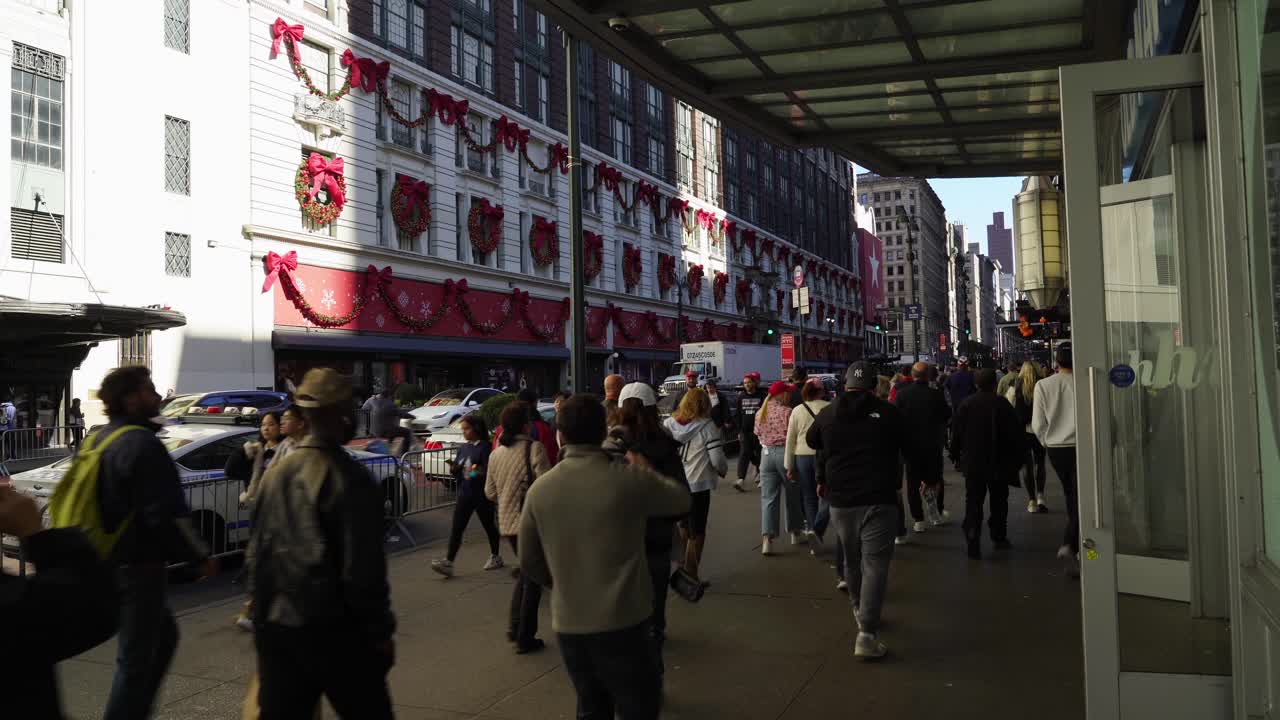 The New York streets are packed with Trump’s supporters, the bright sun casting shadows as the crowd cheers and chants