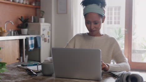 young-woman-using-laptop-computer-working-from-home-student-brainstorming-project-researching-information-online-drinking-coffee-enjoying-study