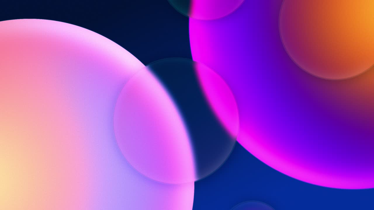 A background animation of two multi-color circles is slowly closing in on each other, while multiple upwards-moving circle shapes are passing over them, causing a liquid glass effect on their surfaces