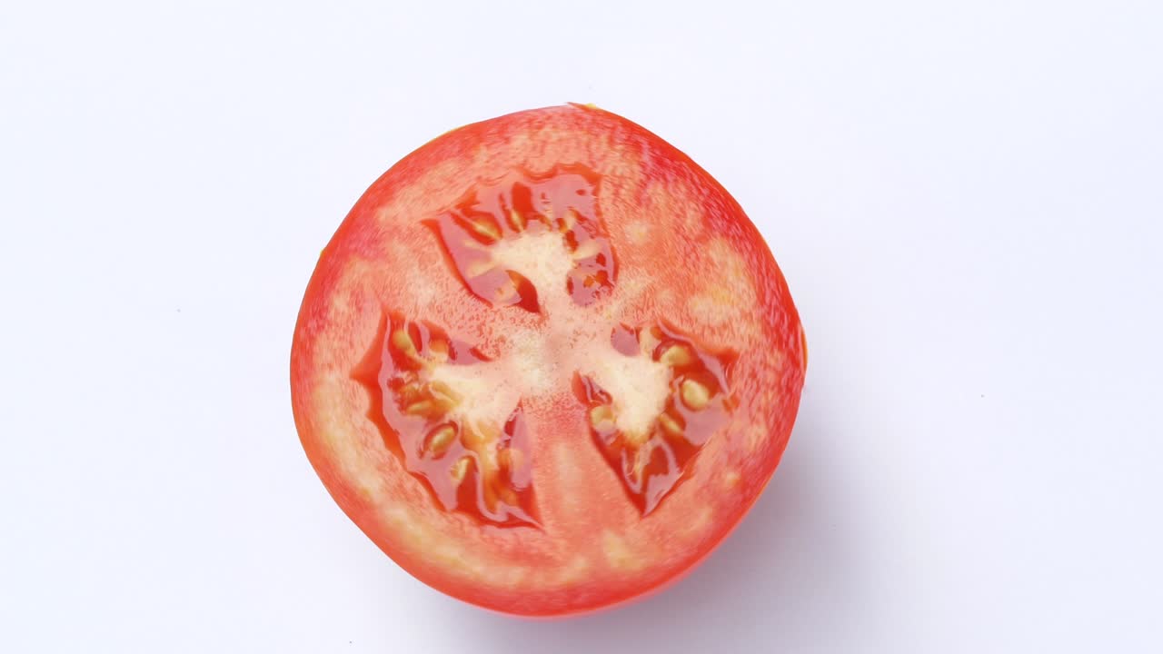 색 배경에 토마토 회전