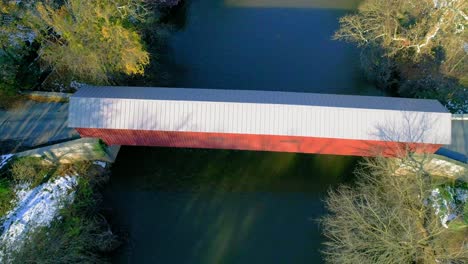 ariel view of a covered bridge in lancaster county pennsylvania as seen by a drone