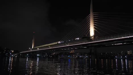 night view of halic bridge highway bridge on the golden horn with lights shining