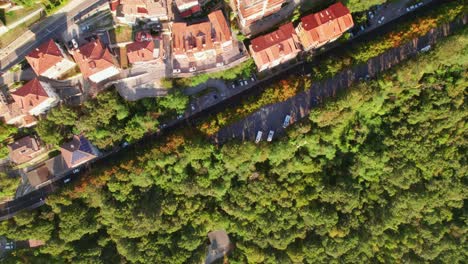 san marino, italy, top down drone view, fly into the city from forest