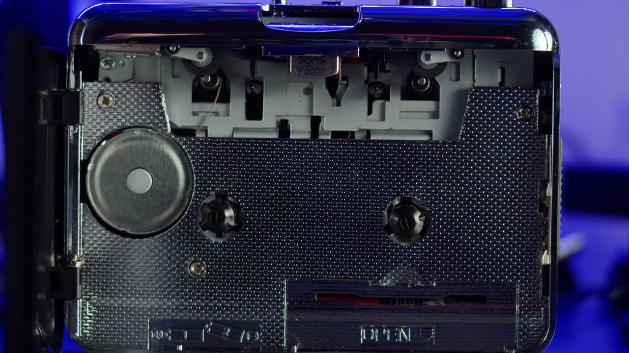 An indepth look at the inner workings of a vintage cassette tape player, highlighting classic audio technology