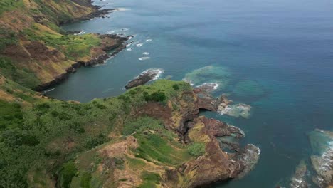 the stunning coastline of santa maria island, azores with clear blue waters, aerial view