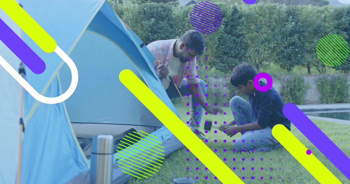 Father and son in backyard hammering tent stake, then inserting poles and framing camping shelter