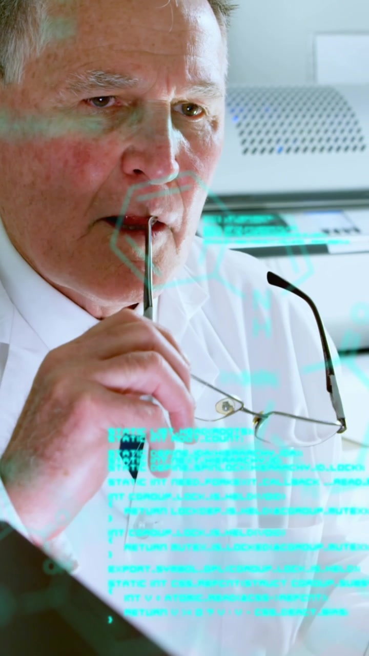 Animation of medical data processing on caucasian senior male scientist using computer at laboratory