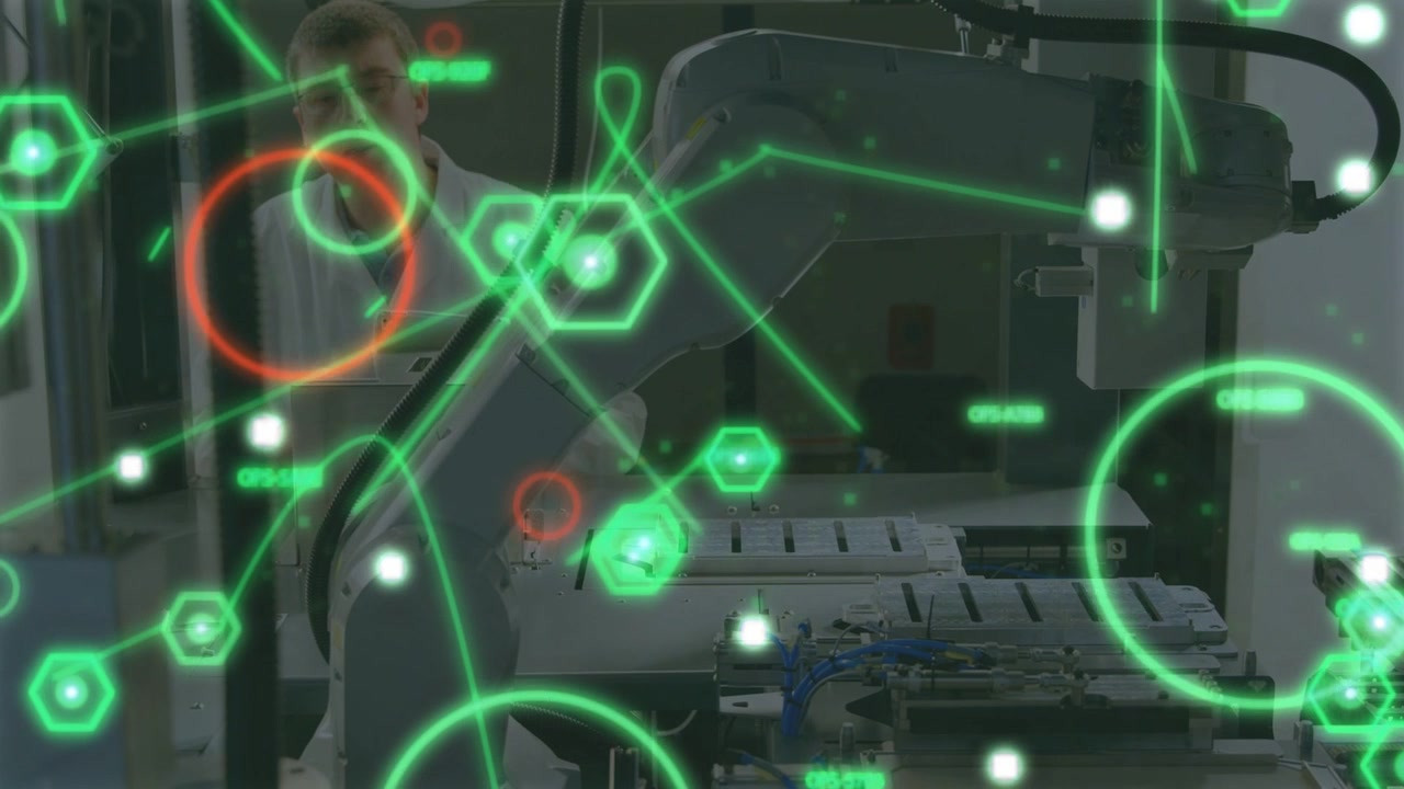 Male tech leaning and checking robot arm and plate as AR overlay intensifying highlighting cables